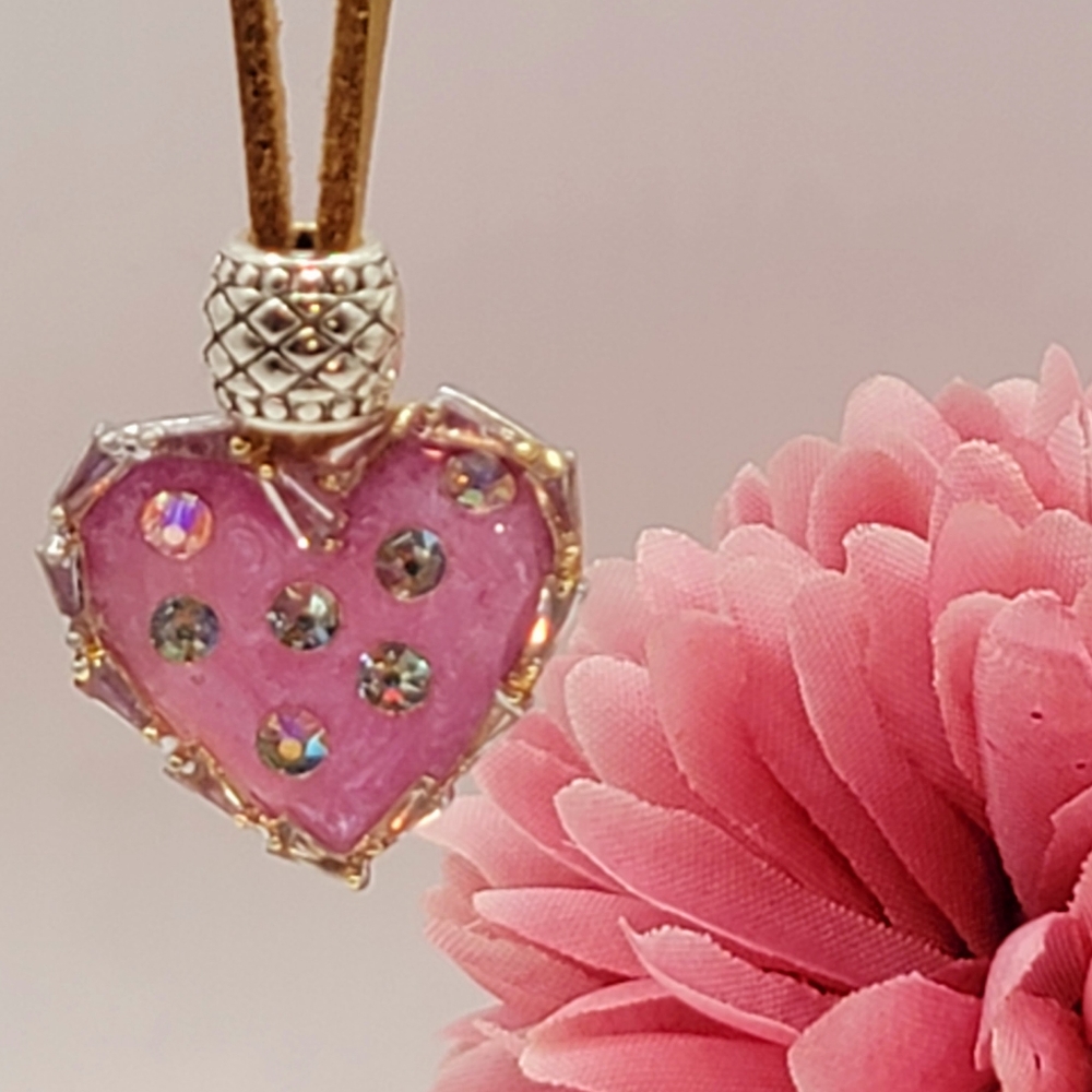 Heart necklace and earrings  with brown suede 20in chain swastika crystal